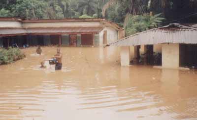 Residential buildings sacked by flood in Umuna.