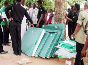 File photo: Police guard some INEC's voting material during election.