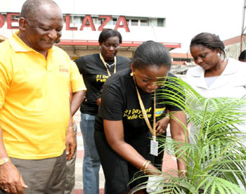 • Mrs. Funmi Omogbenigun, GM, Corporate Communications, MTN, planting a tree to flag-off the annual MTN 21 Days of Y’ello Care, with support from Dr. Newton Jibunoh (left), Founder, Fade Africa and Mrs. Toyin Utomakili, Head, Tree Planting Programme, Lagos State Ministry of Environment, in Lagos.