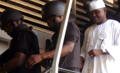 CONDEMNED—Major Hamazat Al-Mustapha, former Chief Security Officer to late Head of State, Gen Sani Abacha, (left) at the Federal High Court Igbosere, Lagos, yesterday. Photos: Kehinde Gbadamosi.