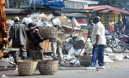 *Refuse collectors at a collection point