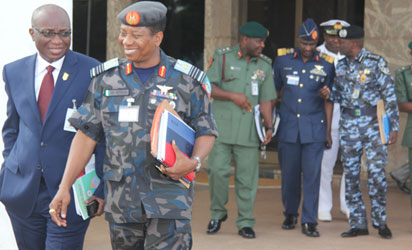Chief of Defence Staff, Air Chief Marshal Oluseyi Petinrin (2nd left) and other security chiefs after a security council meeting chaired by President Goodluck Jonathan at the State House, Abuja, yesterday. Photo: Abayomi Adeshida.