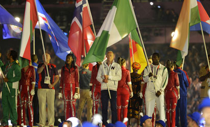 Flags of various nations, including Norway (C) and Nigeria (2nd-R), are displayed during the closing ceremony of the 2012 London Olympic Games at Olympic Stadium on August 12, 2012 in London. Rio de Janeiro will host the 2016 Olympic Games. AFP PHOTO