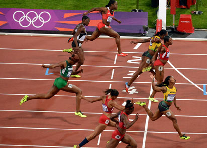 WINNER ... Jamaica's Shelly-Ann Fraser-Pryce crosses the finish line first ahead of others in the women's 100m final on august 4 in london. AFP PHOTO