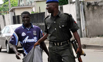 An okada rider arrested by Fashola's security aide for riding against traffic on Hubert Macaulay way,Yaba, Lagos Tuesday.