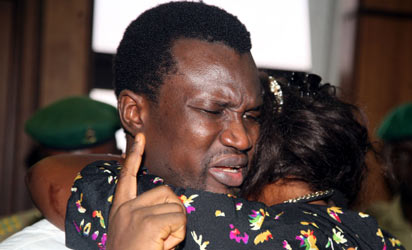 The wife of the convict, Tessy Ebiware with her husband Edmund Ebiware after he was sentenced to life imprisonment at Federal High Court Abuja on Friday. Photo by Gbemiga Olamikan