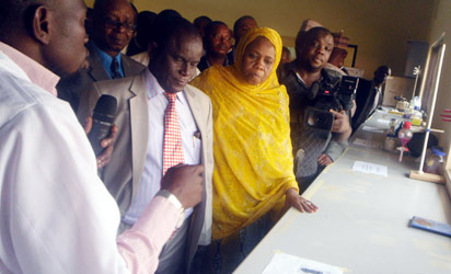 Minister of Science and Tech, Prof. Ita Bassey Okon-Ewa at the Chemistry Advanced Laboratory of the SHEDA Science and Technology complex during a working visit to the agency. Photo:Emma Elebeke.