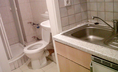 Toilet and  kitchen sink