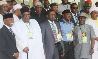 Representative of the President and Minister of Police Affairs, Navy Capt. Caleb Olubolade, rtd, (3rdl)flanked by the Chairman of the event, Alhaji Gambo Jimeta (2ndl) and the Inspector Genral of Police, Alhaji Mohammed Abubakar, while the Interior Minister, Comrade Abba Moro (2ndr); Publisher Vanguard, Mr. Sam Amuka (l) and other dignitaries at the official opening of the National Summit on Security Challenges in Nigeria held at the ICC, Abuja. Photo: Abayomi Adeshida