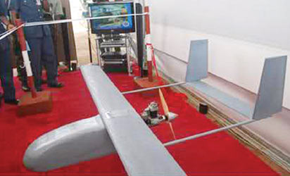 An unmanned aerial vehicle designed and built at the Air Force Institute of Technology on display during the event.