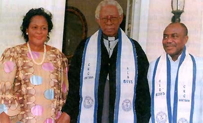 Rev. Fr. N. C. Tagbo, former principal of CKC Onitsha with Dr. and Mrs. Peter Odili