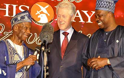 L-R: Teacher Emeritus and nonagenarian, Pa Dotun Oyewole; former President of the United States, Mr Bill Clinton; and Ogun State Governor, Senator Ibikunle Amosun; during the 18th Annual ThisDay Awards to celebrate Nigeria's Best Teachers, at the newly redesigned June 12 Cultural Centre, Abeokuta...yesterday