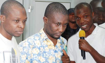 Suspected TerroristS— From Left: Saheed Aderemi Adewumi and Sulaiman Olayinka Saka recruited by Abdullahi Mustapha Berende (right), paraded by the Department of State Security in Abuja, yesterday. Photos: Gbemiga Olamikan.
