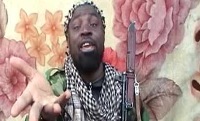 File: A video grab made on March 21, 2013 from a video distributed to reporters by purported intermediaries of the Islamist group linked to Al-Qaeda, Boko Haram,  shows the suspected leader of the Nigerian Islamist group linked to Al-Qaeda, Boko Haram, Imam Abu Muhammad Ibn Muhammad Abubakar Ash Shekawi, also known as Abubakar Shekau, at an undisclosed location in Nigeria. AFP