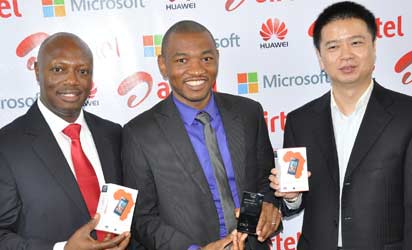 (L-r) Chief Sales Officer, Airtel Nigeria, Inusa Bello; Consumer Channels Group Director, Microsoft, Mark Ihimoyan and Tony Liang Wei, MD, Huawei Devices, West Africa at the unveiling of Huawei Ascends W1 smart phones in Ikoyi, Lagos on Thursday.