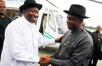 President Goodluck Jonathan being received by Governor Rotimi Amaechi at the Port Harcourt International Airport . The President was on his way to Abuja from Bayelsa Sunday morning.