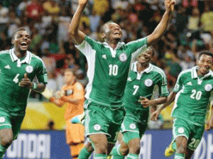 File photo: Mikel celebrates his goal with team mates