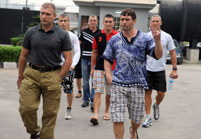 TRIAL—Russian sailors arrive at the Federal High Court in Lagos yesterday, for their trial over alleged illegal importation of arms. AFP photo.