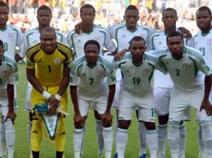 Nigeria's footballers pose for the official picture before the start of the FIFA Confederations Cup Brazil 2013 Group B football match against Tahiti, at the Mineirao Stadium in Belo Horizonte on June 17, 2013. (Standing L-R) Midfielder John Obi Mikel, defender Uwa Echijile, defender Efe Ambrose, defender Kenneth Omeruo, forward Anthony Ujah and midfielder Fegor Ogude. (First row, L-R) Forward Nnamdi Oduamadi, goalkeeper Vincent Enyeama, forward Ahmed Musa, midfielder Sunday Mba and defender Godfrey Oboabona. AFP PHOTO