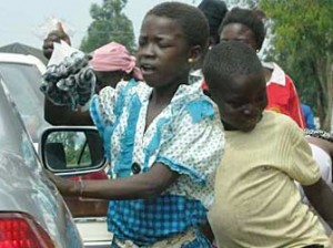 Kids hawking in traffic