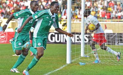 KENYA, Nairobi : Nigeria's Ahmed Musa (R) and Sunday Mba (L) celebrate after Musa scored to make it 1-0 during their 2014 World Cup Qualifying match against Kenya at Kasarani football stadium on June 5, 2013. AFP PHOTO