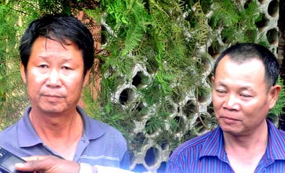 RESCUED: Chinese, Mr Song Jiang She and Zhang Wen Xue after being rescued from their abductors, in Sagamu, yesterday. Photo: NAN.