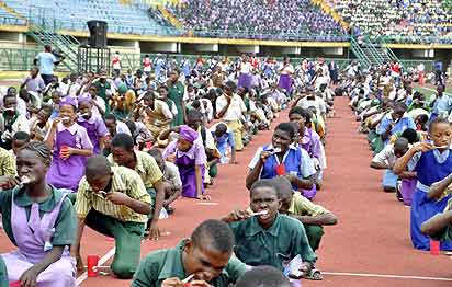 Students Of Different Schools Across Lagos State Brushing their Teeth .At The Lagos World Record Breaking Teeth Brushing Challenge Held at Teslim Balogun Stadium Lagos.PHOTO BY AKEEM SALAU.