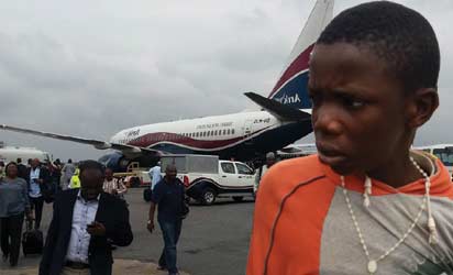 *The apprehended teenager who stowed from Benin.