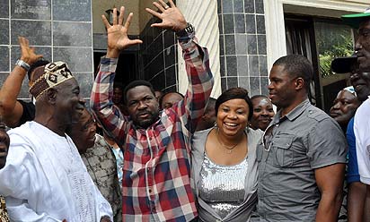 HOME, SWEET HOME: From left: Oba Lasisi Gbadebo Gbadamosi, Onigando of Igando land, Chief Mike Ozekhome, SAN, his wife, Josephine and his son Mr. Ilugbehai, during the celebration of Chief Ozekhome's release by kidnappers, at his residence at Igando, Lagos, yesterday. Photo: Bunmi Azeez.