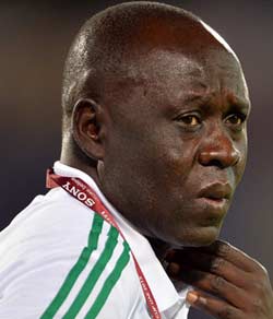 Manu Garba, head coach of Nigeria ponders during the FIFA U17 group F match between Sweden and Nigeria at Khalifa Bin Zayed Stadium on October 22, 2013 in Al Ain, United Arab Emirates. Photo by FIFA