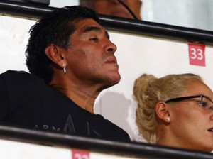 ALL FOR EAGLETS — Diego Armando Maradona looks on during the FIFA U-17 World Cup UAE 2013 Semi Final match between Sweden and Nigeria at Al Rashid Stadium yesterday.