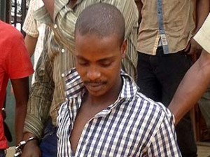 *Killer cop, Corporal Valentine Ofuamaka, being led by prison official into the blackmaria after being arraigned at the Edo state Magistrate Court in Benin city