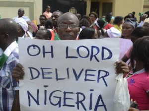 People demonstrate to press for the release of missing Chibok school girls in Lagos on May 12, 2014. Boko Haram released a new video on Monday claiming to show the missing Nigerian schoolgirls, alleging they had converted to Islam and would not be released until all militant prisoners were freed. AFP
