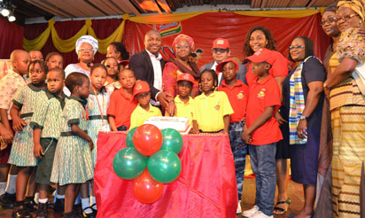 CAPTION; INDOMIE Wife of Lagos State governor,Mrs Dame Emmanuella Fasola (middle) flanked by the MD/CEO of Dufil Prima Food PLC,Mr Deepak Singhal(5th right) PR/Event Manager Dufil Prima Food PLC,Mr Tope Asiwaju(3rd left)the Coordinator Indomie Fan Club,Mrs Faith Joshua(4th left)Mrs Mosunmola Junaid(left)Mrs Olaitan Ipaye (2nd left) Mrs Ayinde Rhoda (3rd right),Mrs Bolanle Pelumi(2nd right),Mrs Asissat Tijani and Indomie Fan Club children during the Indomie Children Day party held at National Theatre Lagos,on 21/5/2014.PHOTO BY ALABA IGBAROOLA.