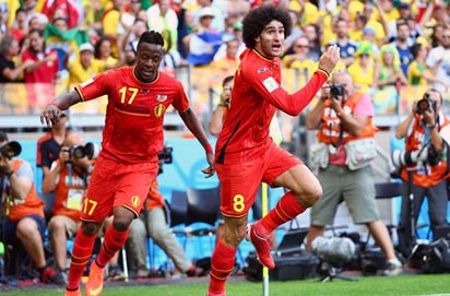 BELO HORIZONTE, BRAZIL - JUNE 17: Marouane Fellaini of Belgium celebrates after scoring the team's first goal during the 2014 FIFA World Cup Brazil Group H match between Belgium and Algeria at Estadio Mineirao on June 17, 2014 in Belo Horizonte, Brazil. (Photo by Alex Grimm - FIFA.