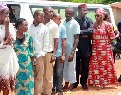 Governorship Candidate, All Progressives Congress, APC, Dr Kayode Fayemi; with his wife, Erelu Bisi Fayemi, (1st and 2nd right) on the queue at Ogilolo Ward, Isan-Ekiti... on Saturday.