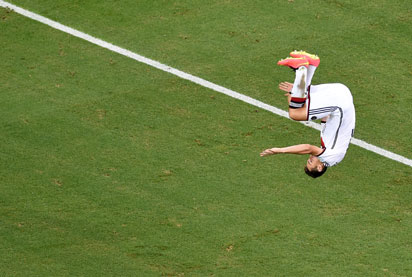 Germany's forward Miroslav Klose celebrates after scoring during a Group G football match between Germany and Ghana at the Castelao Stadium in Fortaleza during the 2014 FIFA World Cup on June 21, 2014. AFP PHOTO/ POOL/ FRANCOIS XAVIER MARIT