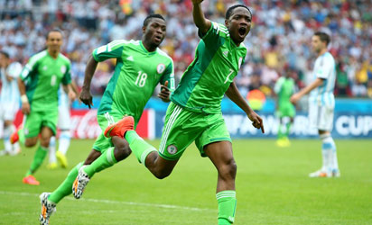 - JUNE 25: Ahmed Musa of Nigeria celebrates scoring his team's second goal during the 2014 FIFA World Cup Brazil Group F match between Nigeria and Argentina at Estadio Beira-Rio on June 25, 2014 in Porto Alegre, Brazi