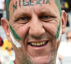 BRAZIL, Curitiba : A Nigerian fan is pictured prior to a Group F football match between Iran and Nigeria at the Baixada Arena in Curitiba during the 2014 FIFA World Cup on June 16, 2014. AFP PHOTO