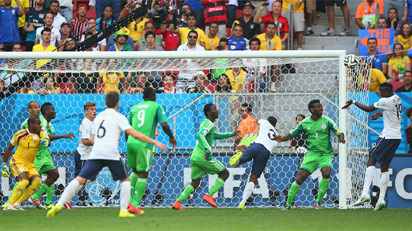 Paul Pogba of France scores his team's first goal on a header past goalkeeper Vincent Enyeama of Nigeria during the 2014 FIFA World Cup Brazil Round of 16 match between France and Nigeria at Estadio Nacional on June 30, 2014 in Brasilia, Brazil. (FIFA)