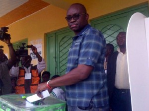 Ayo Fayose casting his vote yesterday...