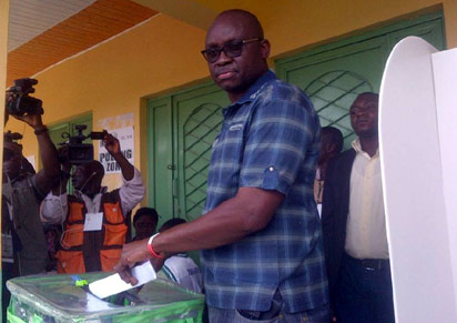 Ayo Fayose casting his vote yesterday...