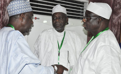 Confab: From left, Alh. Umaru Hadejima discussing with Senator Shaidu Dansadau and Dr Garba Abari during Consideration of Devolution of Power Committee’s Report at National Confab in Abuja. Photo by Gbemiga Olamikan