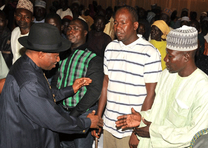 President Jonathan interacting with parents of abducted Chibok girls at the State House