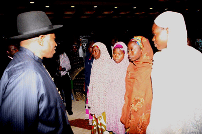 President Jonathan interacting with Chibok girls at the State House