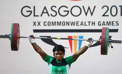 GOOD LIFT: Obioma Okoli competes in the 63kg women’s weightlifting event at the Commonwealth Games. She won a silver medal for Nigeria.
