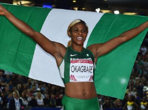 Nigeria's Blessing Okagbare celebrates winning the women's 100m athletics event at Hampden Park during the 2014 Commonwealth Games in Glasgow, Scotland on July 28, 2014. AFP PHOTO
