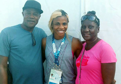 Bolt Me Up... Mr and Mrs Bolt wishing Blessing Okagbare well in Glasgow 2014.