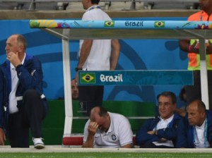 Brazil's coach Luiz Felipe Scolari (L) reacts during the semi-final football match between Brazil and Germany at The Mineirao Stadium in Belo Horizonte on July 8, 2014, during the 2014 FIFA World Cup. AFP PHOTO / PEDRO UGARTE