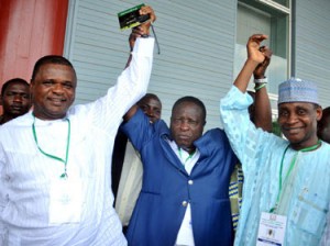 BEFORE THE CRACK: Dr. Rafiu Ladipo (m) raises the hands of Chief Mike Umeh (l) and Aminu Maigari after their election in 2010.